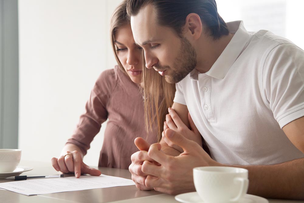 couple reviewing document